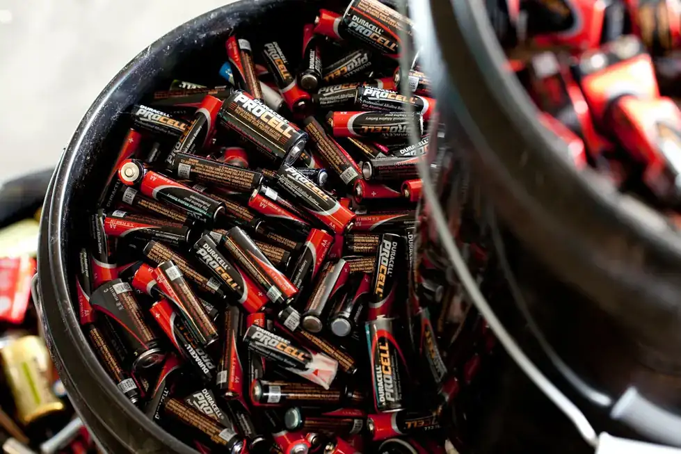 A bucket of used batteries
