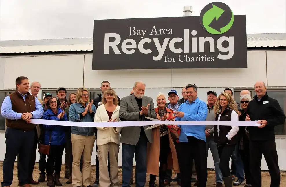 Community members gathered for a ribbon-cutting outside the facility